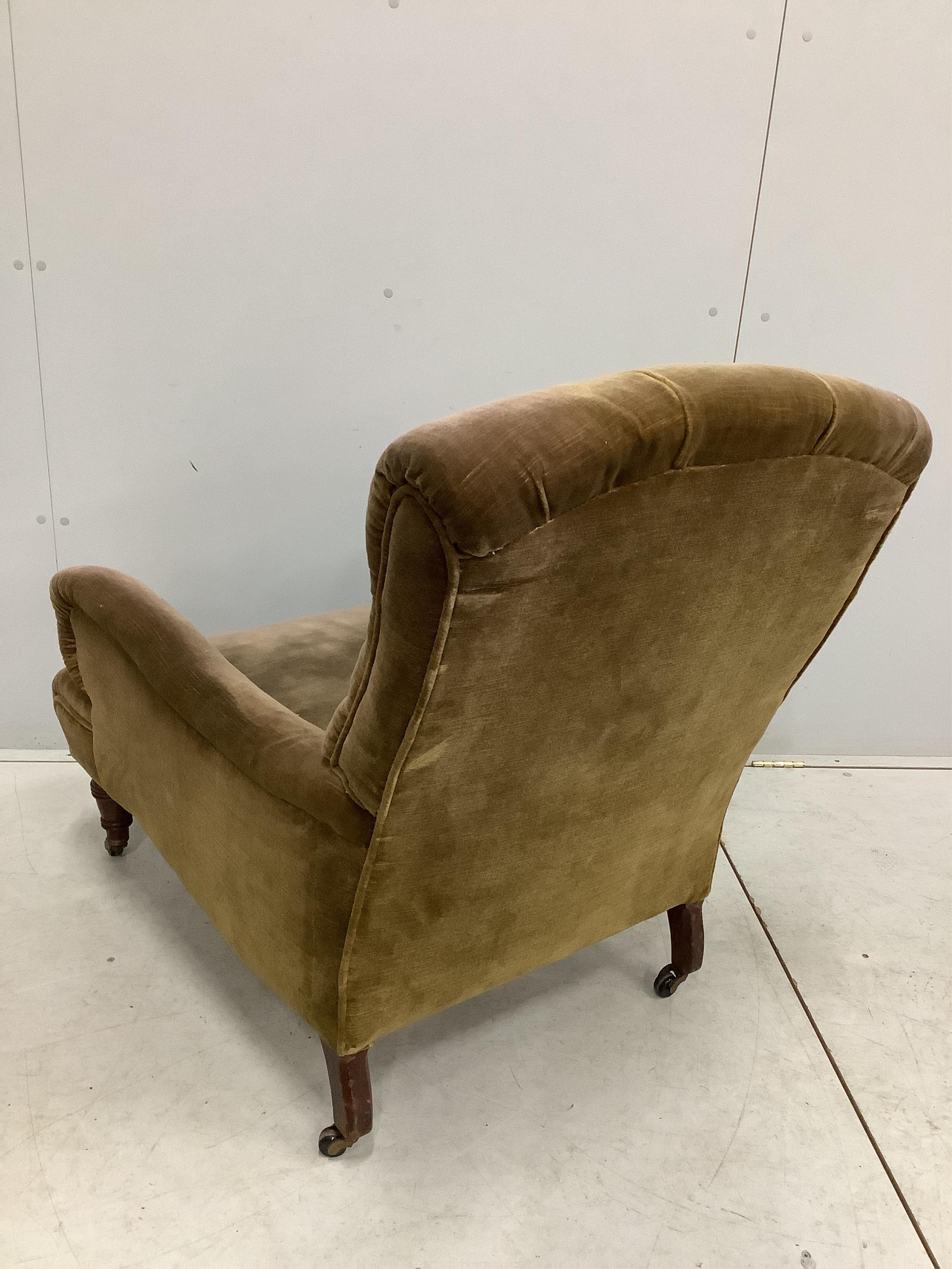 A Victorian Howard style armchair, width 76cm, depth 86cm, height 92cm. Condition - fair